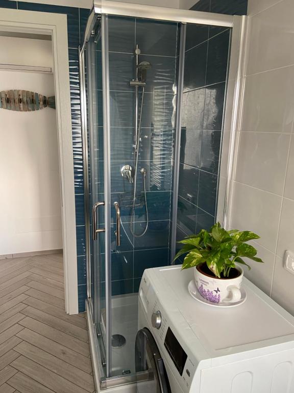 A bathroom at AGM Suite - Rome Airport FCO - Fiumicino Mare