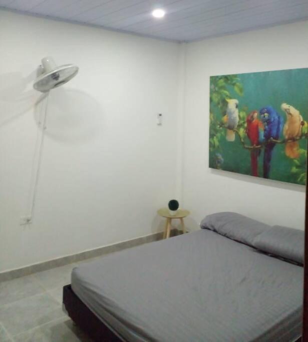 Postel nebo postele na pokoji v ubytování Hermoso y cómodo apartamento en Leticia