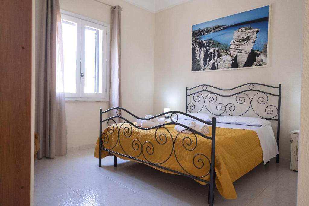 Posteľ alebo postele v izbe v ubytovaní Le cale di Favignana Cala Rossa