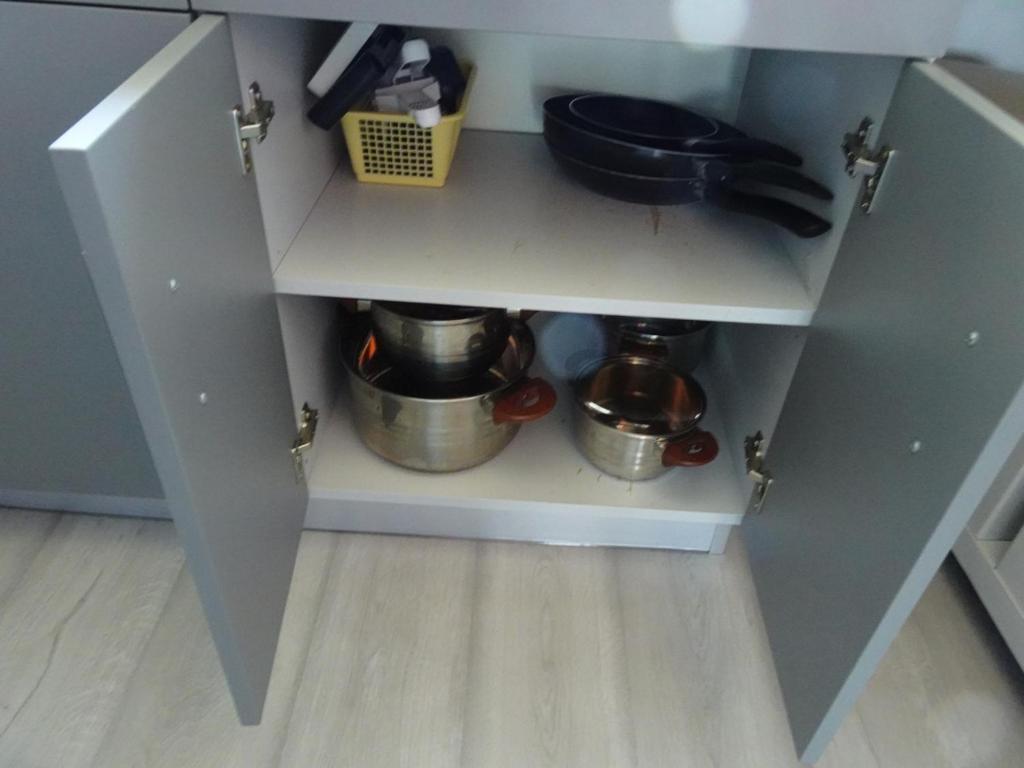 Kuchyň nebo kuchyňský kout v ubytování GRUNWALD APARTMENTS