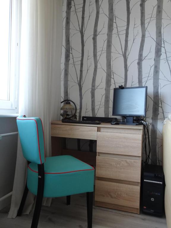 TV a/nebo společenská místnost v ubytování GRUNWALD APARTMENTS