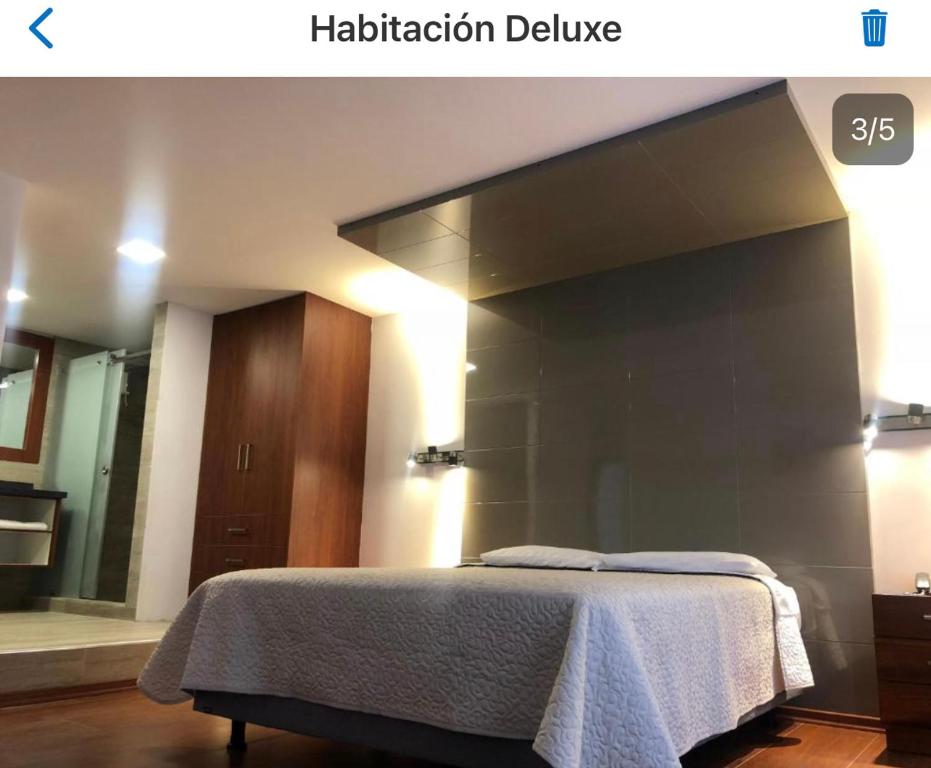 Postel nebo postele na pokoji v ubytování Hotel Bacastell
