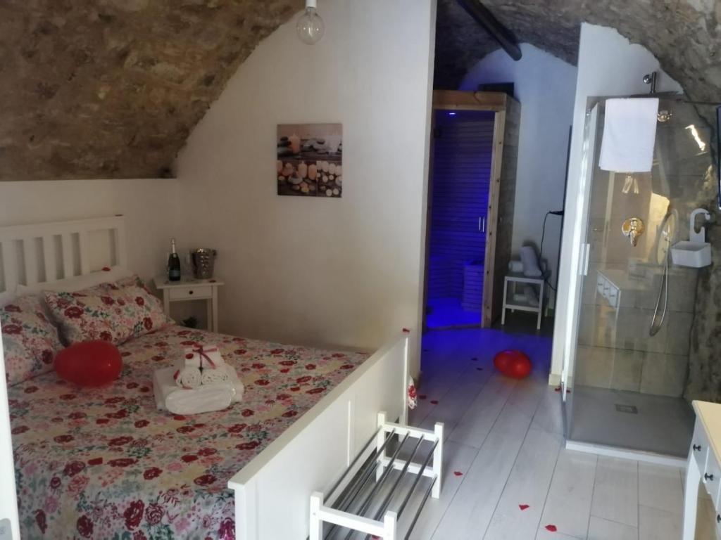 Postel nebo postele na pokoji v ubytování Il Daviduccio ibla