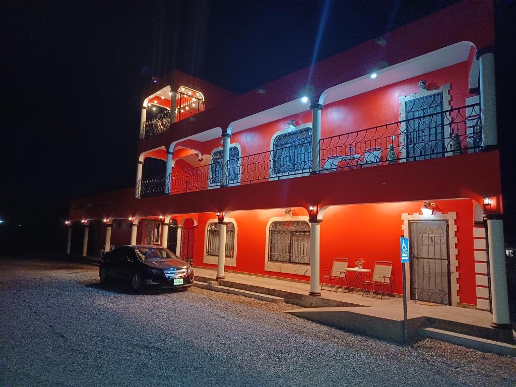 a car parked in front of a building at night at Hacienda Gallardos 104-3 in San Carlos