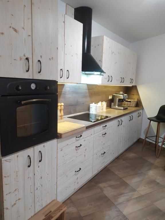 Kuchyň nebo kuchyňský kout v ubytování Villa Jarka