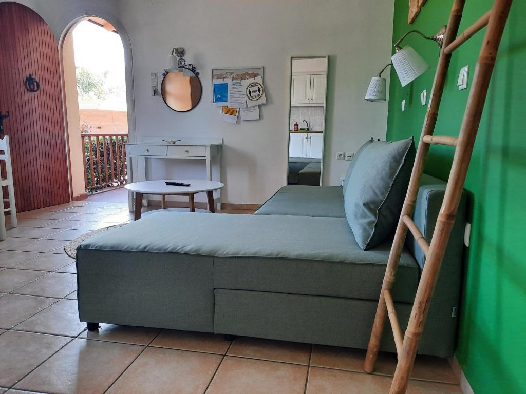 A bed or beds in a room at Athina Apartments