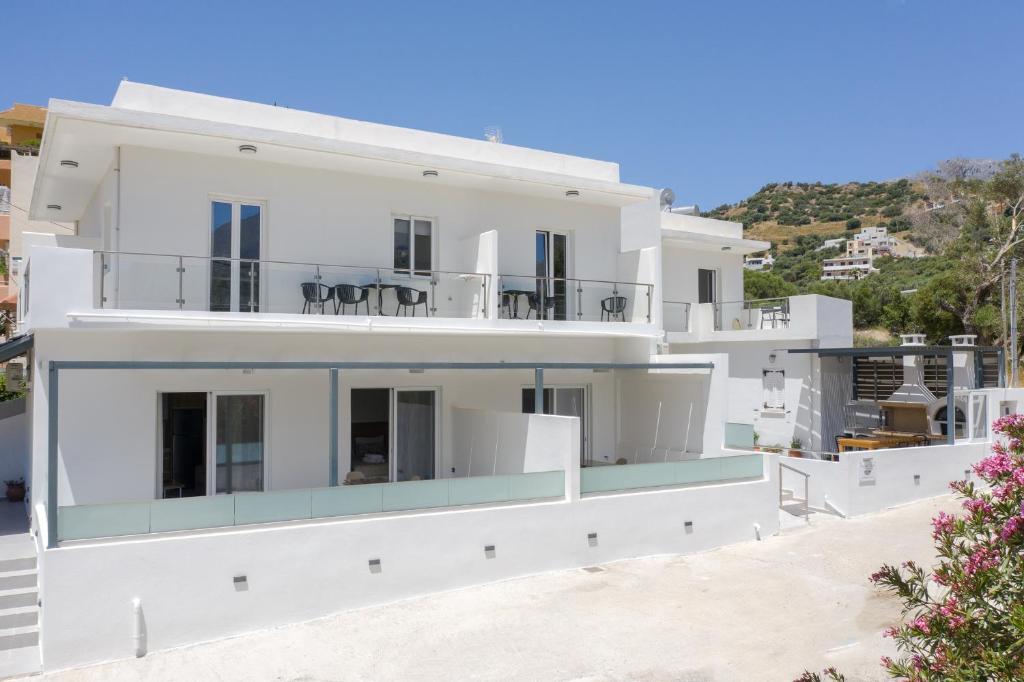 a view of a house with white at Secret Nest in Plakias