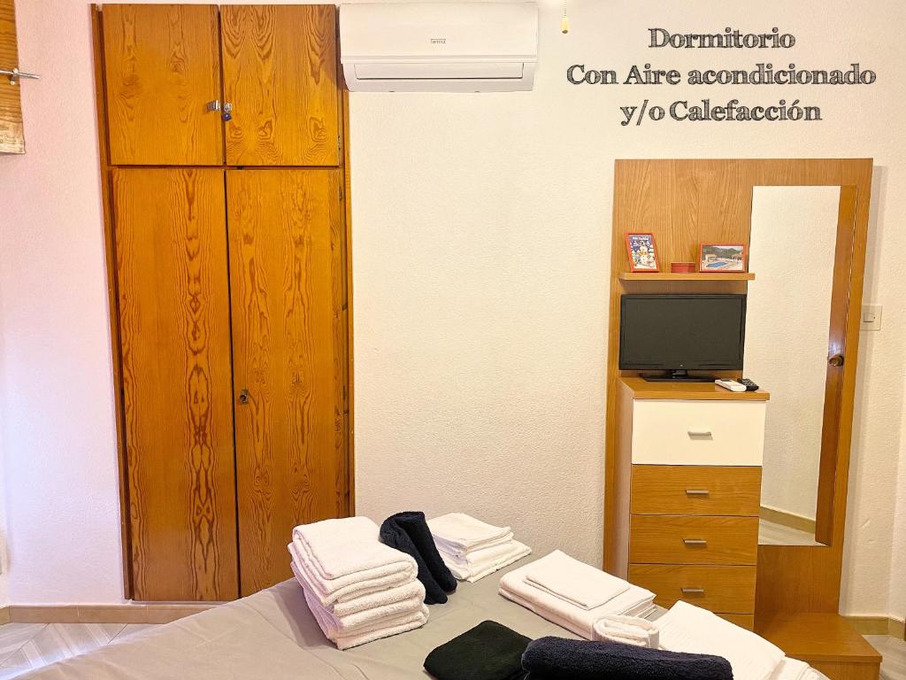 A bed or beds in a room at Las Gondolas 602