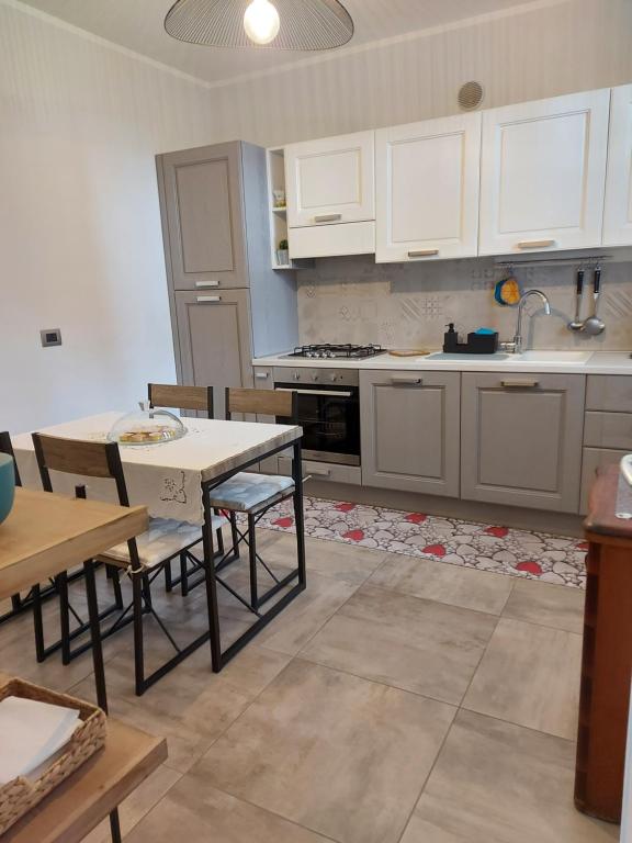 Kuchyň nebo kuchyňský kout v ubytování Casa dell'Agrifoglio