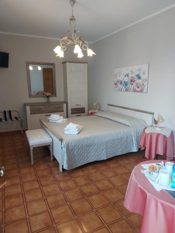 Postel nebo postele na pokoji v ubytování Casa dell'Agrifoglio