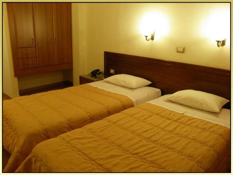 Posteľ alebo postele v izbe v ubytovaní Hotel Meletiou