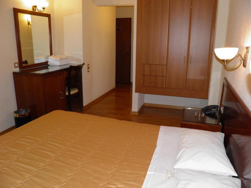 Posteľ alebo postele v izbe v ubytovaní Hotel Meletiou