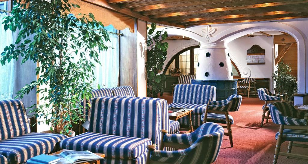 Posezení v ubytování Hotel Miramonti Corvara