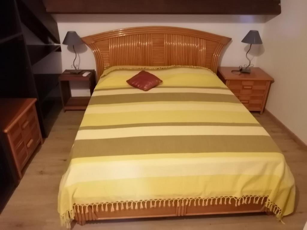Postel nebo postele na pokoji v ubytování SAS L' Ilot Vert