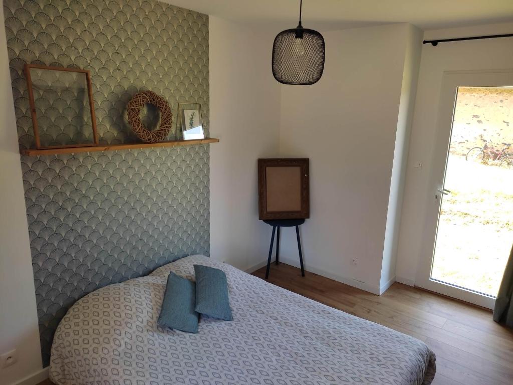 Posteľ alebo postele v izbe v ubytovaní Chambre d'hôtes