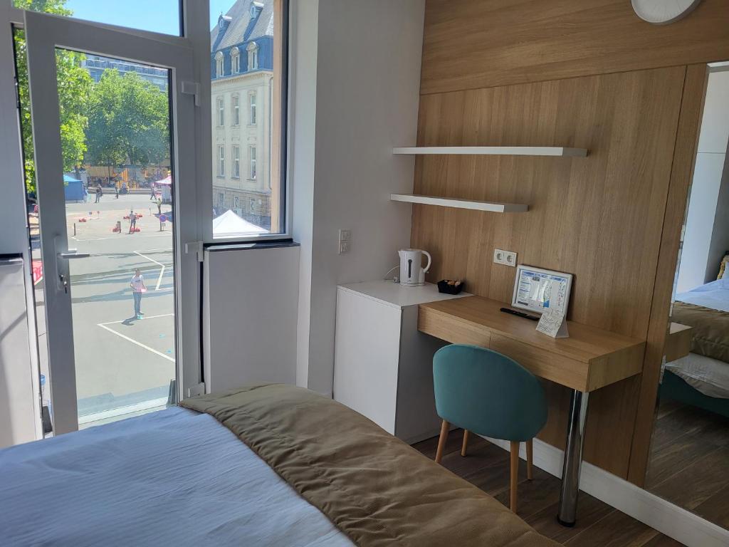 Postel nebo postele na pokoji v ubytování Guesthaus 2