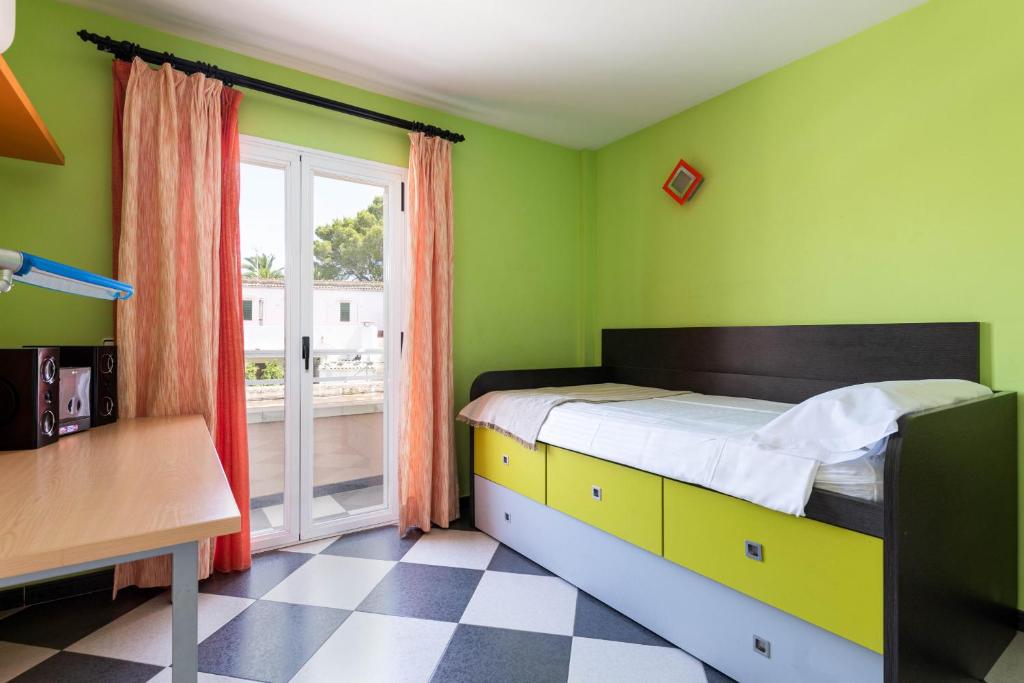 Postel nebo postele na pokoji v ubytování YourHouse Villa Marian