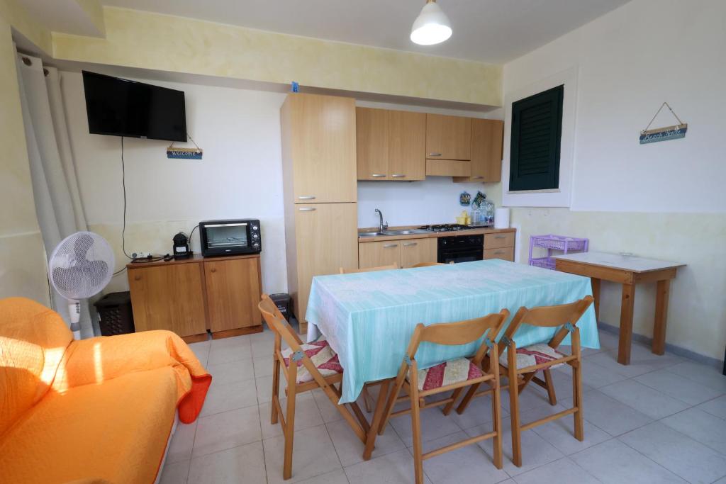 Kuchyň nebo kuchyňský kout v ubytování VILLETTA A SCHIERA UNO vicino MALDIVE DEL SALENTO
