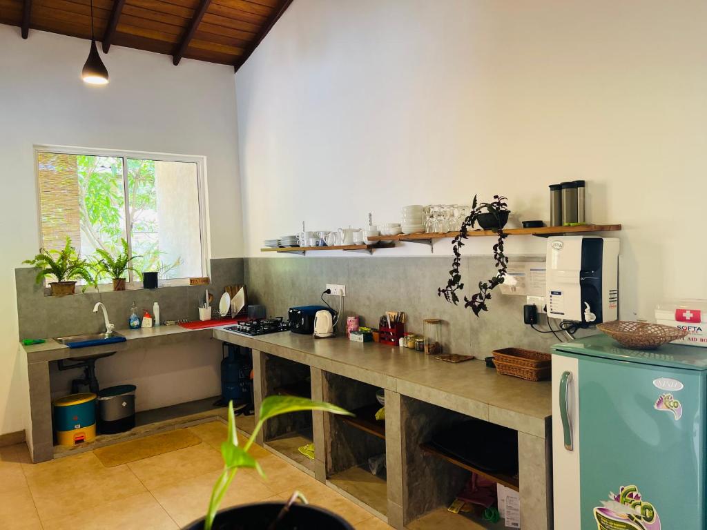 Kuchyň nebo kuchyňský kout v ubytování Feel Home