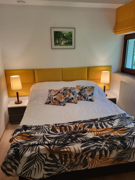 Posteľ alebo postele v izbe v ubytovaní Apartament Perła A31