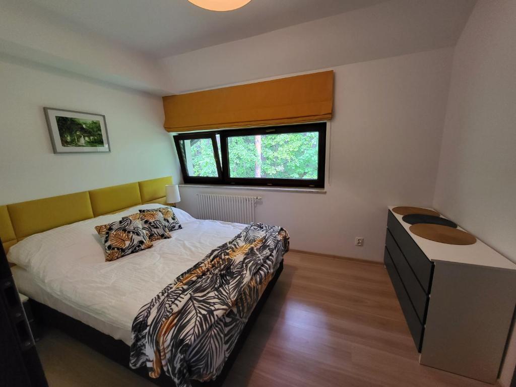 Posteľ alebo postele v izbe v ubytovaní Apartament Perła A31