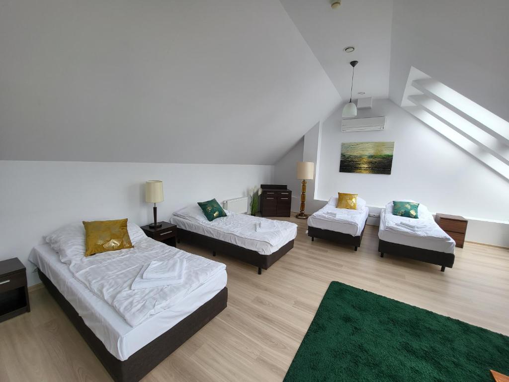 Posteľ alebo postele v izbe v ubytovaní Apartament Perła A31