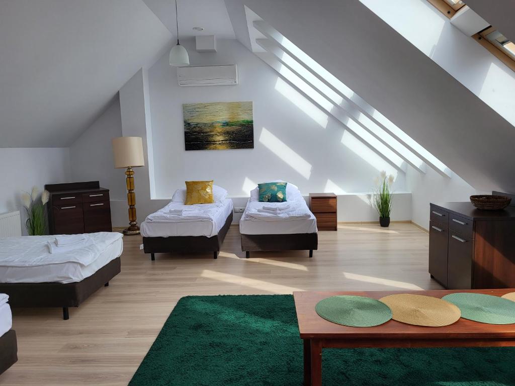 Posteľ alebo postele v izbe v ubytovaní Apartament Perła A31
