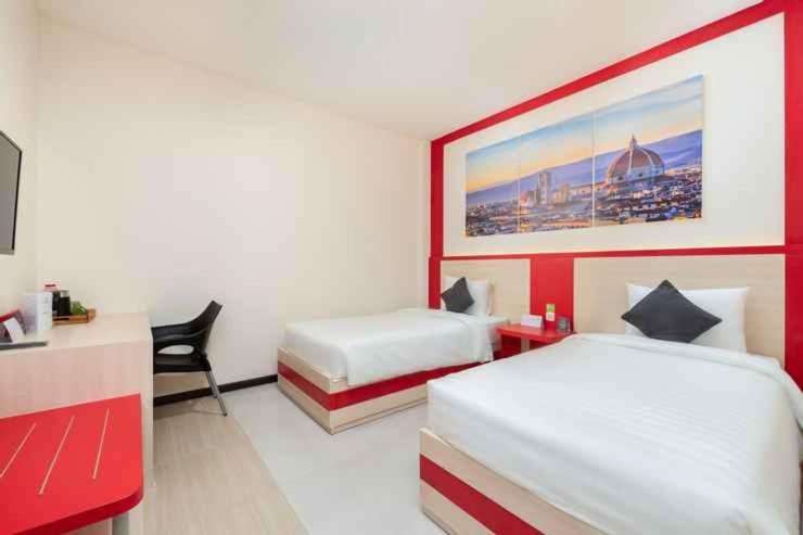 Postel nebo postele na pokoji v ubytování D'Carol Hotel