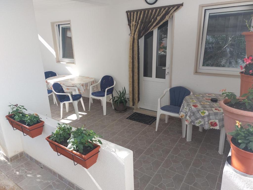 Posedenie v ubytovaní Apartments Slavica