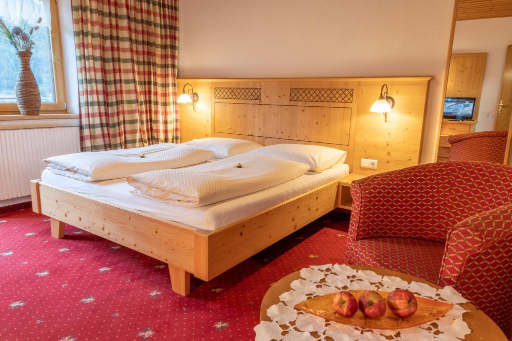 Postel nebo postele na pokoji v ubytování Frühstückspension Seeblick