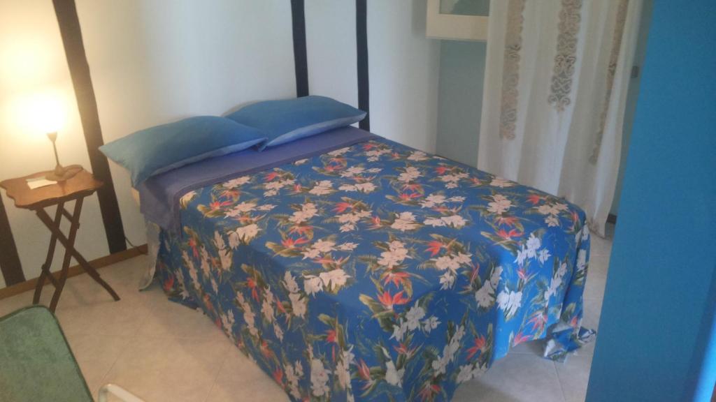 Łóżko lub łóżka w pokoju w obiekcie Le Vallonee B&B