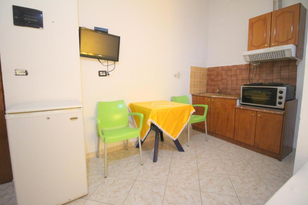 Kuchyň nebo kuchyňský kout v ubytování Hotel Vila Vilson