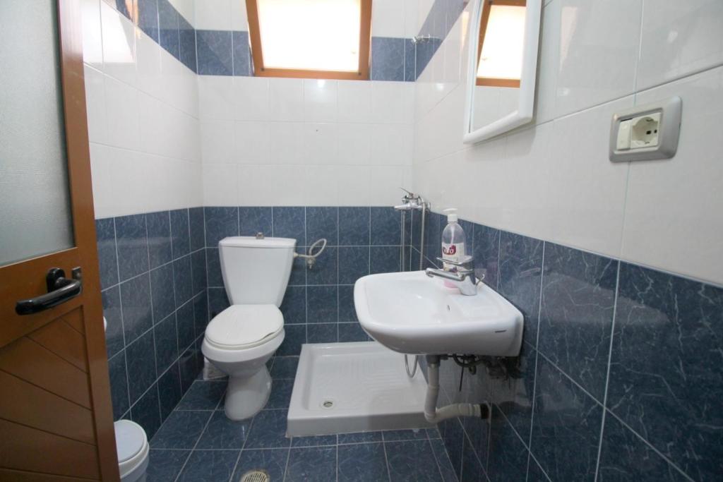Koupelna v ubytování Hotel Vila Vilson