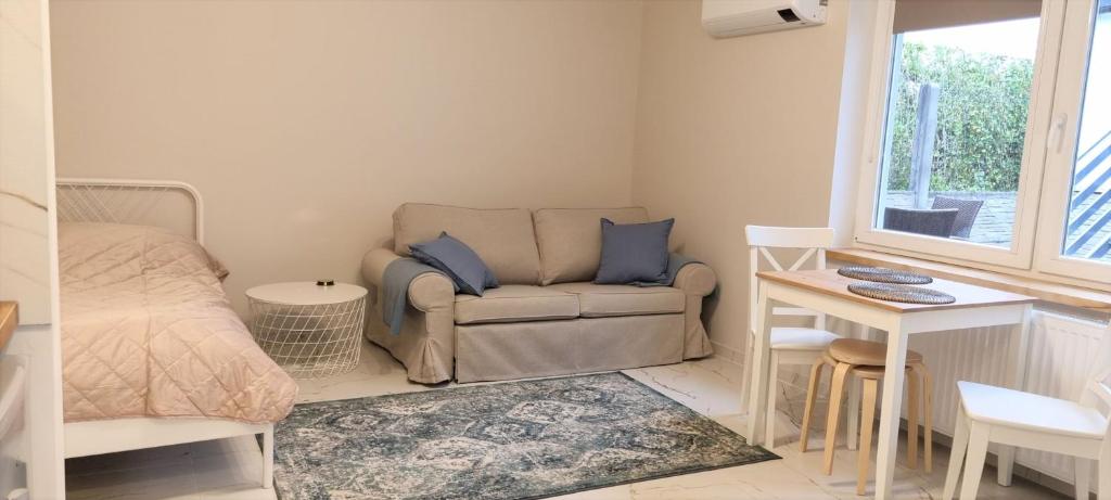 Posedenie v ubytovaní Nowe Apartamenty na Gryfa
