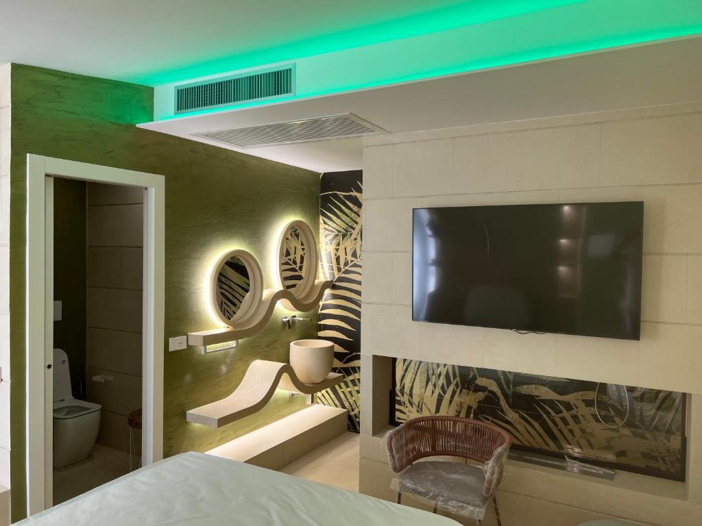 TV a/nebo společenská místnost v ubytování Euphoria Resort