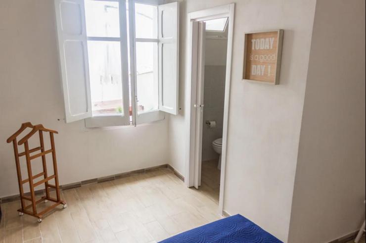 Posteľ alebo postele v izbe v ubytovaní [DOWNTOWN SELINUS] Bright apartment with courtyard