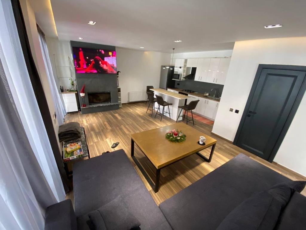 TV a/nebo společenská místnost v ubytování Riverside