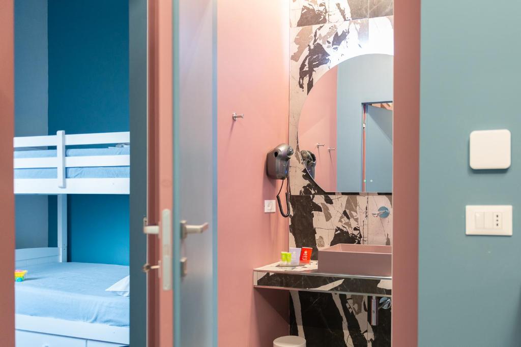 Postel nebo postele na pokoji v ubytování Pescara Blu B&B