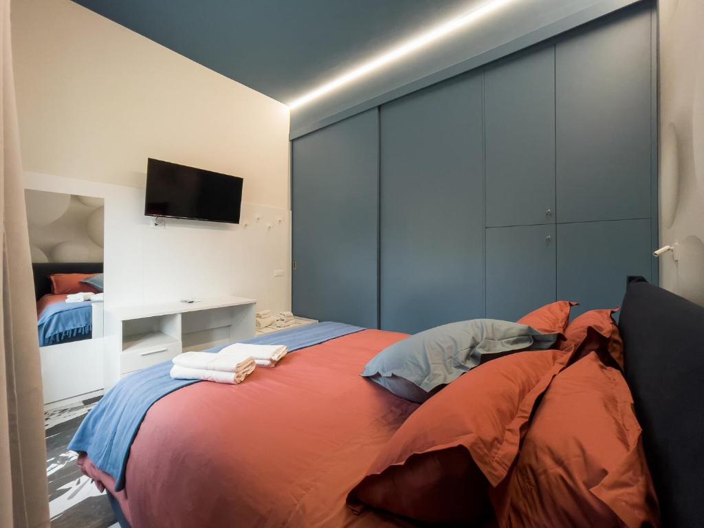 Postel nebo postele na pokoji v ubytování Pescara Blu B&B