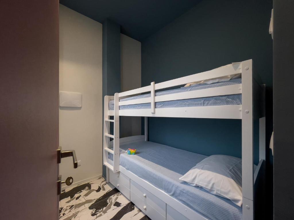 Postel nebo postele na pokoji v ubytování Pescara Blu B&B