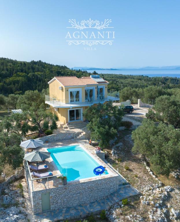 an aerial view of a villa with a swimming pool at Villa Agnanti in Vlachopoulátika