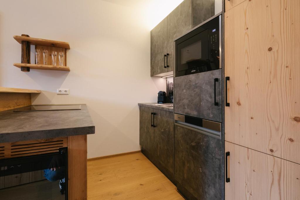 Kuchyň nebo kuchyňský kout v ubytování SunApart by Apart4you