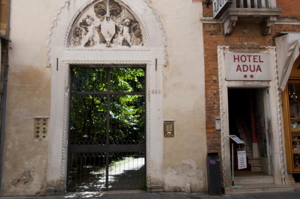 an entrance to a building with a large door at Hotel Adua in Venice