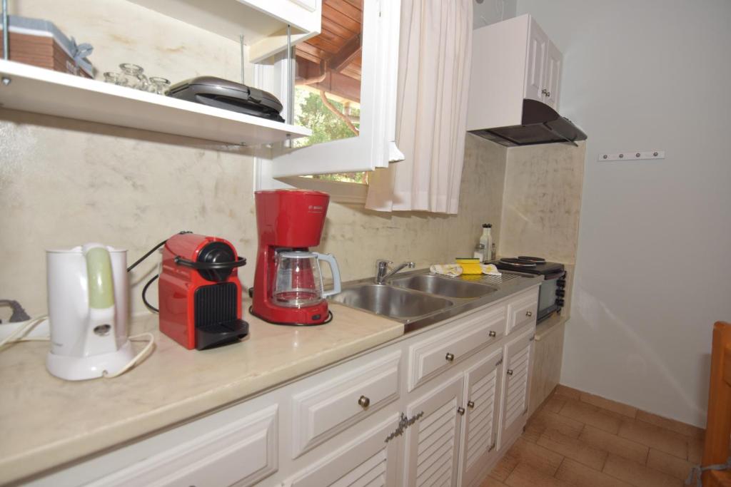 Kuchyňa alebo kuchynka v ubytovaní Baracunda Apartments