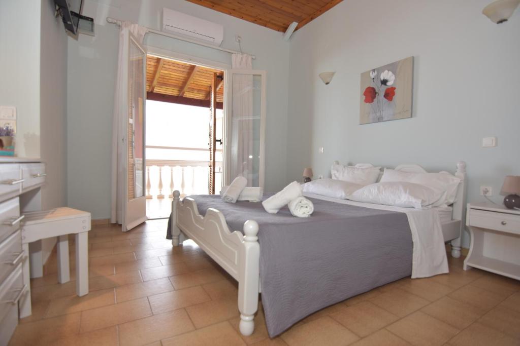 Posteľ alebo postele v izbe v ubytovaní Baracunda Apartments