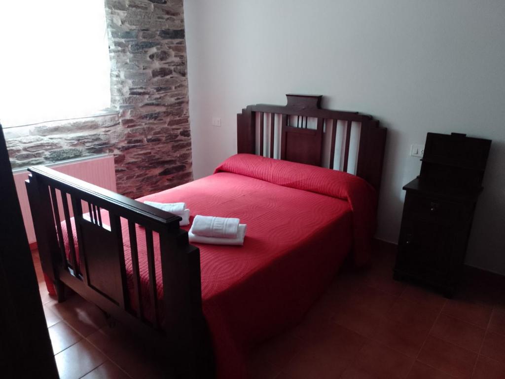 Postel nebo postele na pokoji v ubytování Casa Arza