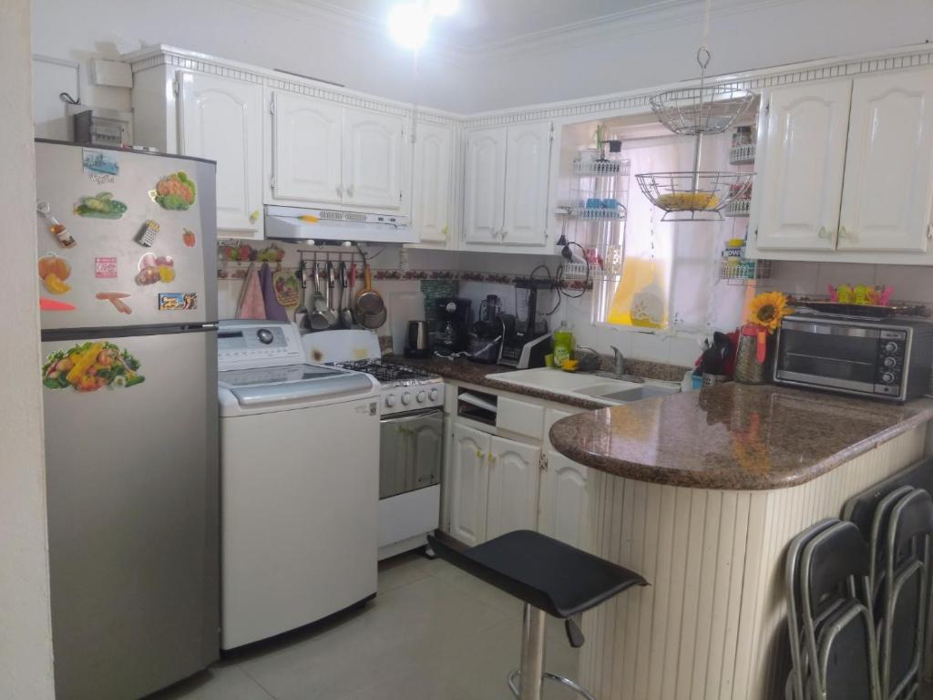 Kuchyň nebo kuchyňský kout v ubytování M & L Shared Apartment