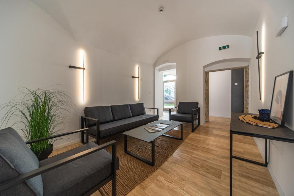 Posezení v ubytování r12 Apartments