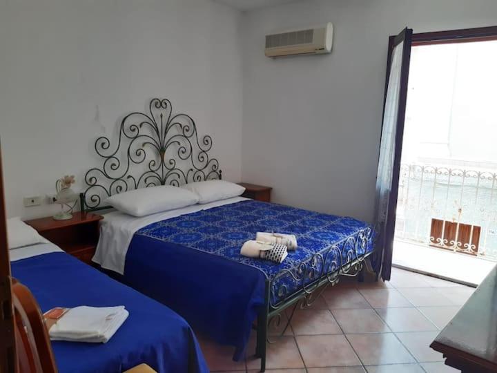 Postel nebo postele na pokoji v ubytování La casa di Paolo e Silvia