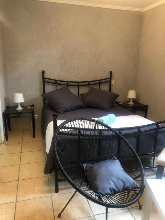 Postel nebo postele na pokoji v ubytování Chez Anidé